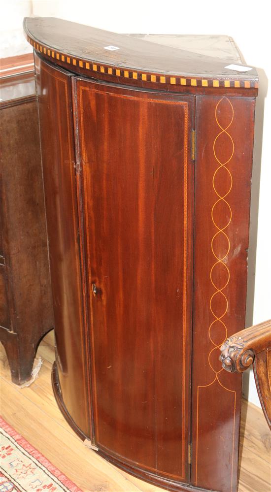 A GIII inlaid mahogany bow front hanging corner cupboard W.80cm